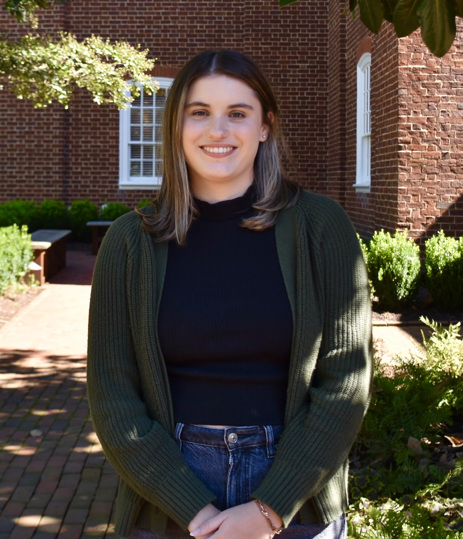 Headshot of Sabrina LaBold in graduation regalia